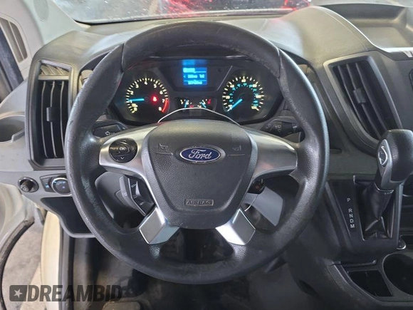 2016 Ford Transit Cargo z VIN 1FTYE1YM9GKB18600, wystawiony jako IAAI lot #42726792 z przebiegiem 127 434 mil mil oraz . Historia ofert i sprzedaży dostępna na DreamBid. Obrazek 26.