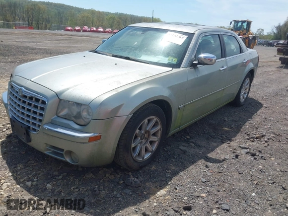 2005 Chrysler 300 with VIN 2C3AA63H65H522824, listed as a IAAI auction lot 42133787 with 266,724 mi miles. Bid and sale history available at carsss.com. Image 2.
