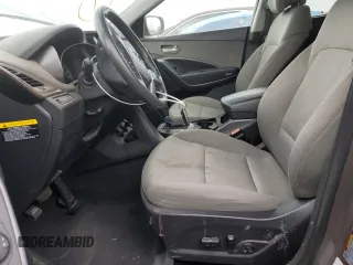 2018 Hyundai Santa Fe 2.4L с VIN 5NMZU3LB0JH055625, выставлен на аукционе Copart как лот 63696515 с пробегом 92 326 миль миль и Списание • Salvage title. История ставок и продаж доступна на DreamBid. Изображение 7.