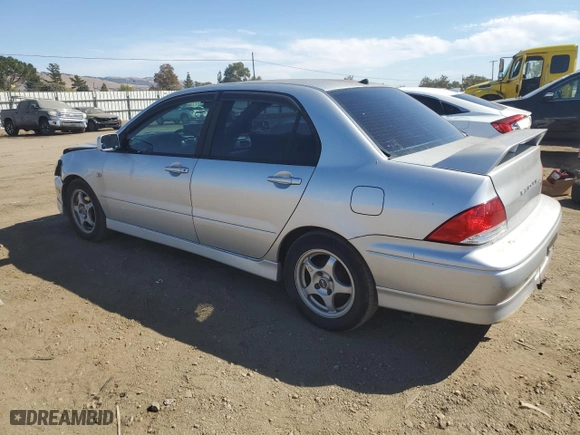 2003 Mitsubishi Lancer OZ-Rally with VIN JA3AJ86E43U048700, listed as a Copart auction lot 73719154 with 178,121 mi miles and Salvage Title. Bid and sale history available at carsss.com. Image 2.