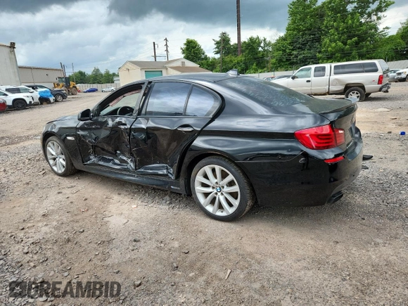 2013 BMW 5 Series 550i xDrive with VIN WBAFU9C55DDY72065, listed as a Copart auction lot 63023675 with 117,592 mi miles and Salvage title. Bid and sale history available at DreamBid. Image 2.
