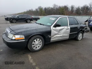 2005 Mercury Grand Marquis LS Premium with VIN 2MEHM75W55X672057, listed as a Copart auction lot 49697115 with 133,234 mi miles and Salvage Title. Bid and sale history available at carsss.com. Image 1.