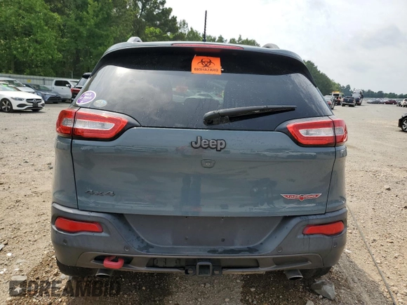 2014 Jeep Cherokee Trailhawk z VIN 1C4PJMBS4EW156550, wystawiony jako Copart lot #56870165 z przebiegiem 100 184 mil mil oraz Szkoda całkowita • Salvage title. Historia ofert i sprzedaży dostępna na DreamBid. Obrazek 6.
