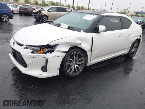 2014 Scion tC z VIN JTKJF5C77E3080128, wystawiony jako IAAI lot #42174898 z przebiegiem Nie podano mil oraz . Historia ofert i sprzedaży dostępna na DreamBid. Obrazek 6.
