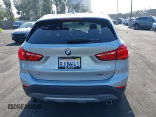 2019 BMW X1 xDrive28i with VIN WBXHT3C56K5L38658, listed as a IAAI auction lot 42496734 with 49,373 mi miles and . Bid and sale history available at DreamBid. Image 16.