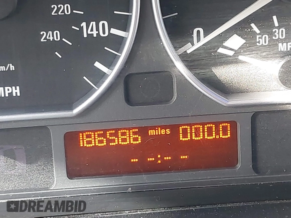 2003 BMW 3 Series 330i with VIN WBAEV53453KM03321, listed as a IAAI auction lot 41134433 with 186,586 mi miles. Bid and sale history available at carsss.com. Image 16.