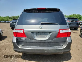 2007 Honda Odyssey LX z VIN 5FNRL38257B011710, wystawiony jako Copart lot #61163265 z przebiegiem 196 575 mil mil oraz Czysty tytuł • Clean title. Historia ofert i sprzedaży dostępna na DreamBid. Obrazek 6.