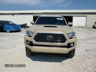 2019 Toyota Tacoma SR z VIN 3TMCZ5AN1KM285074, wystawiony jako Copart lot #53545975 z przebiegiem 53 838 mil mil oraz Szkoda całkowita • Salvage title. Historia ofert i sprzedaży dostępna na DreamBid. Obrazek 14.