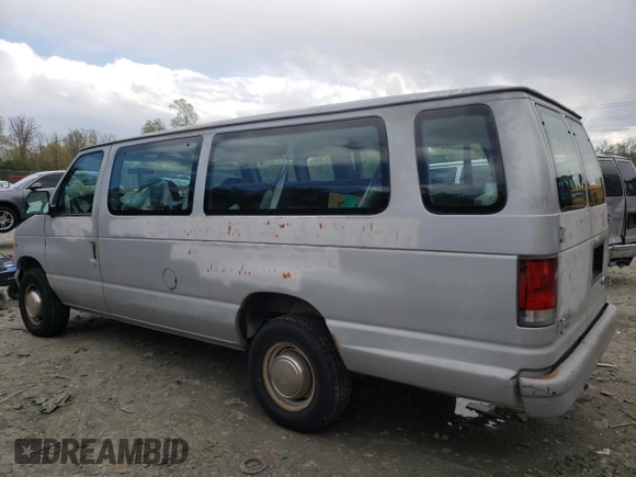 1999 Ford Econoline Passenger XL with VIN 1FBSS31LXXHA39417, listed as a Copart auction lot 52817645 with 109,930 mi miles and Salvage title. Bid and sale history available at DreamBid. Image 2.