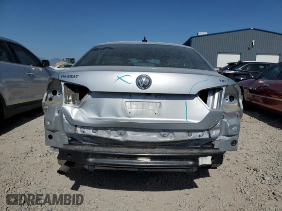 2015 Volkswagen Passat Wolfsburg Edition with VIN 1VWAS7A36FC110135, listed as a Copart auction lot 61097945 with 111,284 mi miles and Salvage title. Bid and sale history available at DreamBid. Image 6.