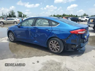 2017 Ford Fusion Hybrid SE z VIN 3FA6P0LU6HR319103, wystawiony jako Copart lot #58494695 z przebiegiem 104 483 mil mil oraz Szkoda całkowita • Salvage title. Historia ofert i sprzedaży dostępna na DreamBid. Obrazek 2.