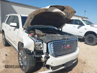 2015 GMC Yukon Denali with VIN 1GKS2CKJ3FR568729, listed as a IAAI auction lot 41741987 with 154,729 mi miles. Bid and sale history available at carsss.com. Image 6.