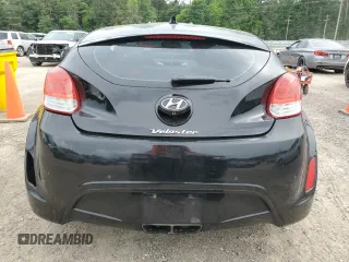 2014 Hyundai Veloster z VIN KMHTC6AD8EU193177, wystawiony jako Copart lot #55472315 z przebiegiem 90 633 mil mil oraz Szkoda całkowita • Salvage title. Historia ofert i sprzedaży dostępna na DreamBid. Obrazek 6.