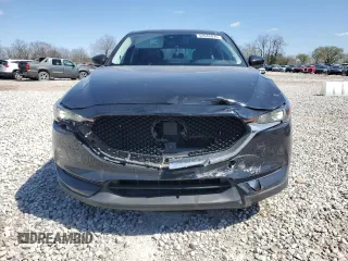 2021 Mazda CX-5 Touring z VIN JM3KFBCM5M0438706, wystawiony jako Copart lot #52048075 z przebiegiem 50 288 mil mil oraz Szkoda całkowita • Salvage title. Historia ofert i sprzedaży dostępna na DreamBid. Obrazek 5.