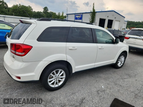 2017 Dodge Journey SXT z VIN 3C4PDCBG9HT571161, wystawiony jako Copart lot #64129155 z przebiegiem 260 314 mil mil oraz Czysty tytuł • Clean title. Historia ofert i sprzedaży dostępna na DreamBid. Obrazek 3.