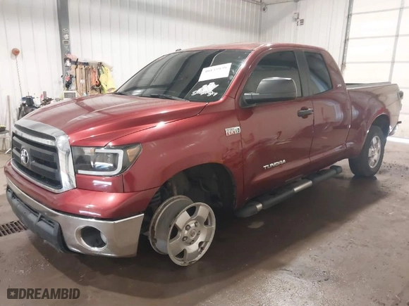2010 Toyota Tundra 4WD Truck with VIN 5TFUW5F1XAX144077, listed as a IAAI auction lot 40135939 with 152,828 mi miles. Bid and sale history available at carsss.com. Image 2.