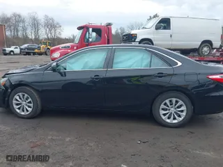 2015 Toyota Camry XLE with VIN 4T4BF1FK1FR515288, listed as a IAAI auction lot 41951737 with 74,471 mi miles. Bid and sale history available at carsss.com. Image 14.