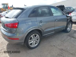 2017 Audi Q3 Premium with VIN WA1ECCFS6HR001548, listed as a IAAI auction lot 42435367 with 94,596 mi miles and . Bid and sale history available at DreamBid. Image 4.