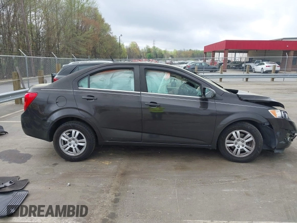 2013 Chevrolet Sonic LT with VIN 1G1JC5SH9D4193932, listed as a IAAI auction lot 41923606 with 132,339 mi miles and . Bid and sale history available at DreamBid. Image 14.
