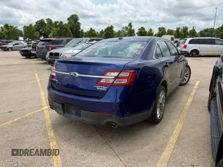 2014 Ford Taurus Limited with VIN 1FAHP2F84EG141388, listed as a Copart auction lot 61052645 with 112,876 mi miles and Clean title. Bid and sale history available at DreamBid. Image 4.