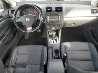 2008 Volkswagen Jetta Wolfsburg Edition z VIN 3VWRJ71K98M189900, wystawiony jako Copart lot #77866404 z przebiegiem 143 209 mil mil oraz Czysty tytuł • Clean title. Historia ofert i sprzedaży dostępna na DreamBid. Obrazek 8.