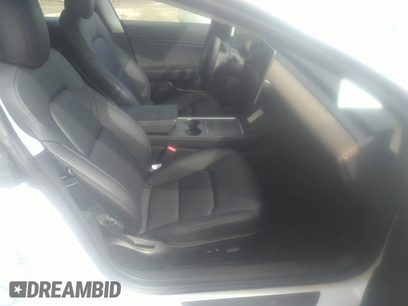 2021 Tesla Model 3 Long Range with VIN 5YJ3E1EB8MF943677, listed as a IAAI auction lot 36373517 with 23,726 mi miles and . Bid and sale history available at DreamBid. Image 5.