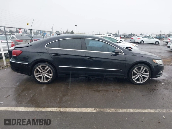 2013 Volkswagen CC Lux with VIN WVWRP7AN7DE510490, listed as a IAAI auction lot 41457328 with 154,443 mi miles. Bid and sale history available at carsss.com. Image 13.