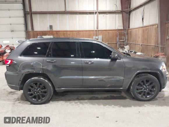 2017 Jeep Grand Cherokee Laredo with VIN 1C4RJFAG8HC910038, listed as a IAAI auction lot 41928179 with 76,862 mi miles. Bid and sale history available at carsss.com. Image 13.