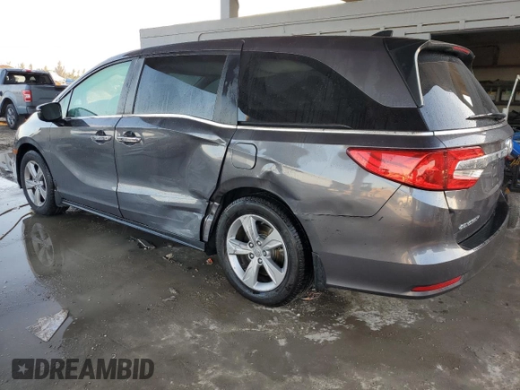 2019 Honda Odyssey EX-L with VIN 5FNRL6H71KB126181, listed as a Copart auction lot 77083064 with 48,590 mi miles and Salvage Title. Bid and sale history available at DreamBid. Image 2.