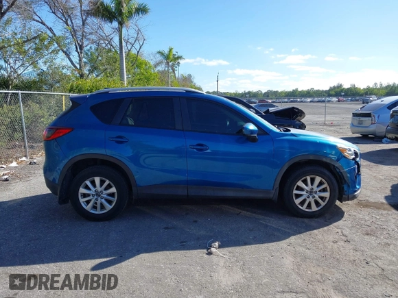 2014 Mazda CX-5 Touring with VIN JM3KE2CYXE0310873, listed as a IAAI auction lot 41309633 with 175,325 mi miles and . Bid and sale history available at DreamBid. Image 14.