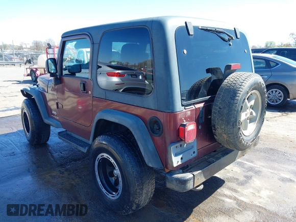 2003 Jeep Wrangler Sport with VIN 1J4FA49S33P345192, listed as a IAAI auction lot 41801344 with 196,472 mi miles. Bid and sale history available at carsss.com. Image 3.