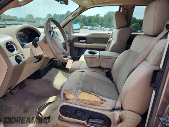 2005 Ford F-150 XLT with VIN 1FTRX12565KB21614, listed as a Copart auction lot 61488075 with 202,747 mi miles and Salvage title. Bid and sale history available at DreamBid. Image 7.