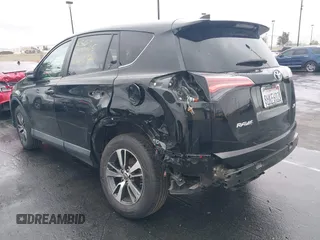 2018 Toyota RAV4 XLE with VIN 2T3WFREV3JW516867, listed as a IAAI auction lot 41765369 with 54,390 mi miles. Bid and sale history available at carsss.com. Image 3.