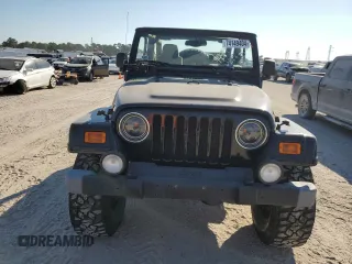 2004 Jeep Wrangler Sahara with VIN 1J4FA59S04P772756, listed as a Copart auction lot 47973495 with 92,685 mi miles and Salvage Title. Bid and sale history available at DreamBid. Image 5.