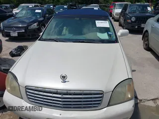 2002 Cadillac DeVille z VIN 1G6KD54Y42U206950, wystawiony jako IAAI lot #42189419 z przebiegiem 98 150 mil mil oraz . Historia ofert i sprzedaży dostępna na DreamBid. Obrazek 6.