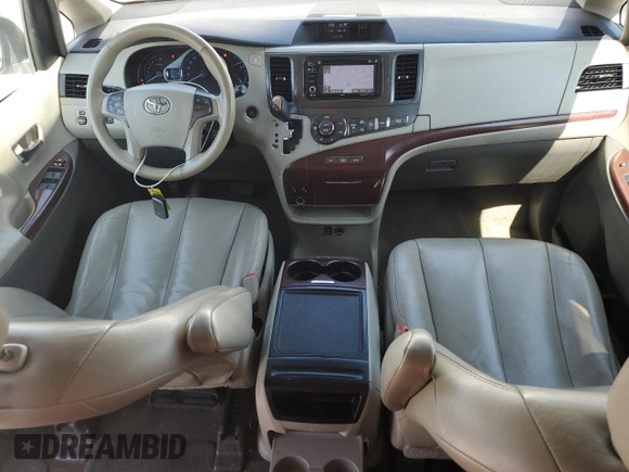 2013 Toyota Sienna XLE AAS с VIN 5TDYK3DC8DS391355, выставлен на аукционе Copart как лот 59232155 с пробегом 230 999 миль миль и Списание • Salvage title. История ставок и продаж доступна на DreamBid. Изображение 8.