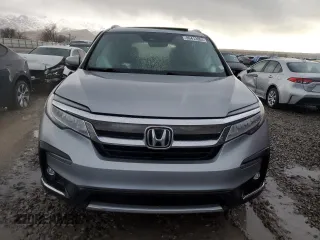 2020 Honda Pilot Touring 8-Passenger with VIN 5FNYF6H9XLB042625, listed as a Copart auction lot 86412804 with 52,061 mi miles and Salvage Title. Bid and sale history available at DreamBid. Image 5.