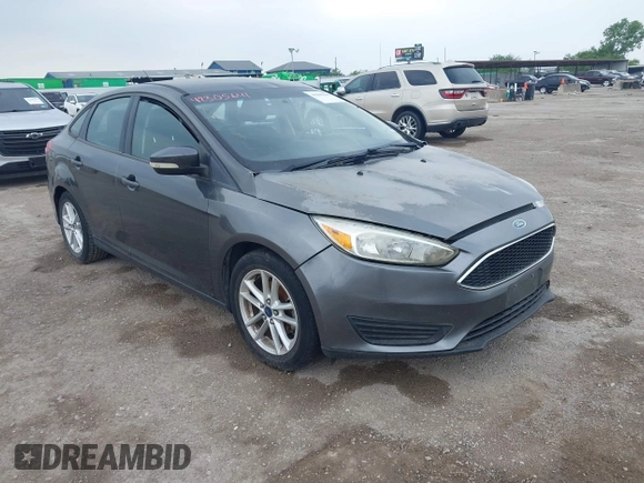 2017 Ford Focus SE z VIN 1FADP3F21HL205009, wystawiony jako IAAI lot #42305641 z przebiegiem 75 160 mil mil oraz . Historia ofert i sprzedaży dostępna na DreamBid. Obrazek 1.