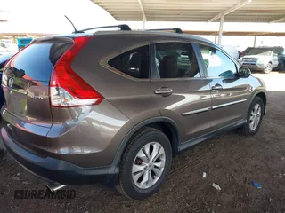 2014 Honda CR-V EX-L with VIN 2HKRM4H72EH665478, listed as a IAAI auction lot 41970335 with 119,557 mi miles. Bid and sale history available at carsss.com. Image 4.