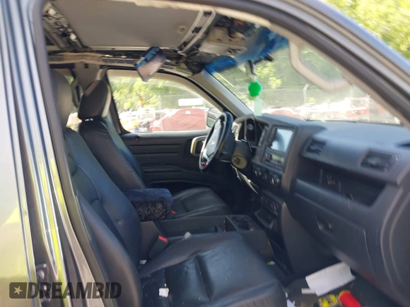 2009 Honda Ridgeline RTL with VIN 2HJYK16539H503533, listed as a IAAI auction lot 42307300 with 206,102 mi miles and . Bid and sale history available at DreamBid. Image 5.