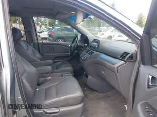 2006 Honda Odyssey EX-L z VIN 5FNRL38776B108949, wystawiony jako IAAI lot #42349613 z przebiegiem 206 240 mil mil oraz . Historia ofert i sprzedaży dostępna na DreamBid. Obrazek 5.