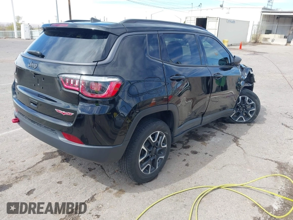 2020 Jeep Compass Trailhawk with VIN 3C4NJDDB7LT129673, listed as a IAAI auction lot 41811055 with 30,106 mi miles and . Bid and sale history available at carsss.com. Image 4.