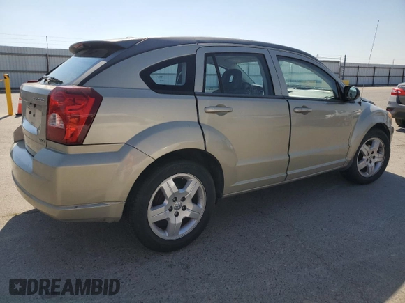 2009 Dodge Caliber SXT z VIN 1B3HB48A19D199410, wystawiony jako Copart lot #55133965 z przebiegiem 141 658 mil mil oraz Szkoda całkowita • Salvage title. Historia ofert i sprzedaży dostępna na DreamBid. Obrazek 3.