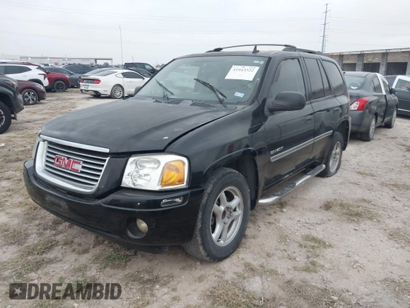 2006 GMC Envoy SLT with VIN 1GKDS13S462241866, listed as a IAAI auction lot 41943322 with 90,695 mi miles. Bid and sale history available at carsss.com. Image 2.