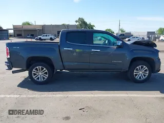 2016 GMC Canyon 4WD SLT with VIN 1GTP6DE15G1323650, listed as a IAAI auction lot 42097101 with 240,662 mi miles. Bid and sale history available at carsss.com. Image 13.