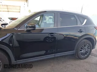 2020 Mazda CX-5 Touring with VIN JM3KFACM0L0804998, listed as a IAAI auction lot 41850998 with 44,519 mi miles. Bid and sale history available at carsss.com. Image 14.