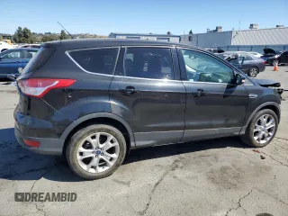 2013 Ford Escape SEL with VIN 1FMCU9H94DUC94456, listed as a Copart auction lot 63872645 with 177,099 mi miles and Salvage title. Bid and sale history available at DreamBid. Image 3.