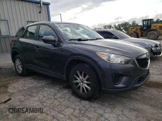 2014 Mazda CX-5 Sport with VIN JM3KE2BE9E0372370, listed as a Copart auction lot 58980165 with 175,477 mi miles and Salvage title. Bid and sale history available at DreamBid. Image 4.