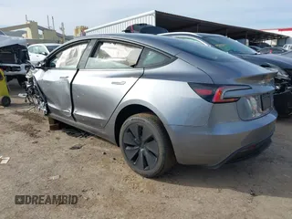 2025 Tesla Model 3 Long Range with VIN 5YJ3E1EB4SF873799, listed as a IAAI auction lot 41548818 with 2,129 mi miles and . Bid and sale history available at DreamBid. Image 3.