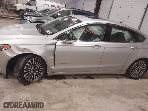 2018 Ford Fusion Titanium with VIN 3FA6P0RU9JR131818, listed as a IAAI auction lot 42442448 with 191,757 mi miles and . Bid and sale history available at DreamBid. Image 14.